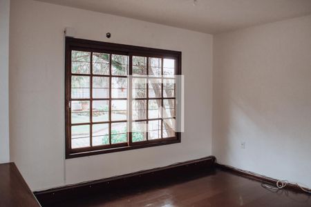 Sala 1 de casa de condomínio à venda com 3 quartos, 199m² em Ipanema, Porto Alegre