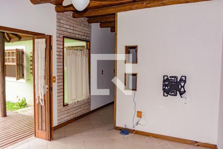 Sala de casa de condomínio para alugar com 4 quartos, 180m² em Rio Tavares, Florianópolis