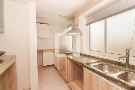 Apartamento à venda com 113m², 2 quartos e 2 vagas Apartamento à venda com 113m², 2 quartos e 2 vagasCozinha e Área de Serviço