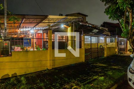 Casa à venda com 130m², 2 quartos e 2 vagas Casa à venda com 130m², 2 quartos e 2 vagasFachada