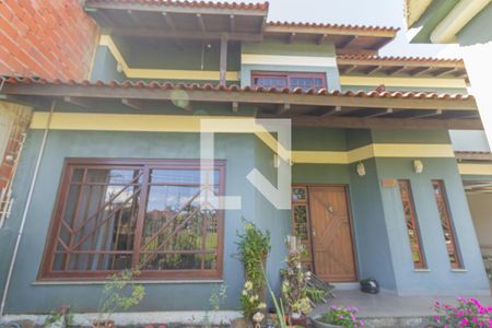 Fachada de casa à venda com 4 quartos, 310m² em Nossa Senhora das Gracas, Canoas