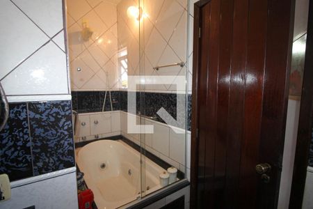 Casa à venda com 410m², 5 quartos e 3 vagasBanheiro da Suíte 1