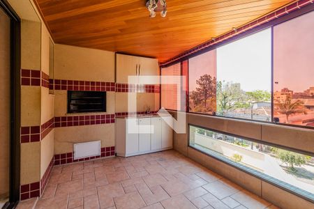 Varanda com churrasqueira de apartamento à venda com 3 quartos, 70m² em Menino Deus, Porto Alegre