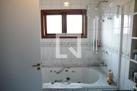 Casa de condomínio para alugar com 750m², 4 quartos e 8 vagasbanheiro da suíte 1 