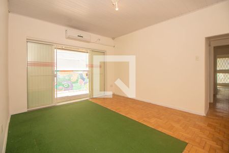 Sala de casa à venda com 3 quartos, 270m² em Rio Branco, Porto Alegre