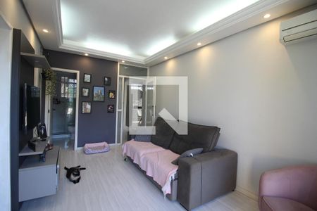 Sala de casa de condomínio à venda com 2 quartos, 87m² em Rio Branco, Canoas