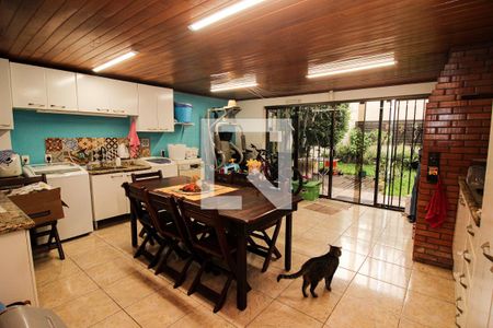 Varanda de casa à venda com 3 quartos, 193m² em Guarujá, Porto Alegre