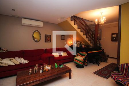 Sala de casa à venda com 3 quartos, 193m² em Guarujá, Porto Alegre