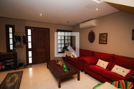 Sala de casa à venda com 3 quartos, 193m² em Guarujá, Porto Alegre