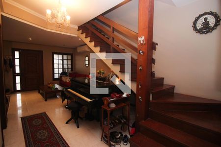 Sala de casa à venda com 3 quartos, 193m² em Guarujá, Porto Alegre