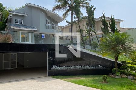 Casa de condomínio à venda com 414m², 4 quartos e 3 vagasFachada