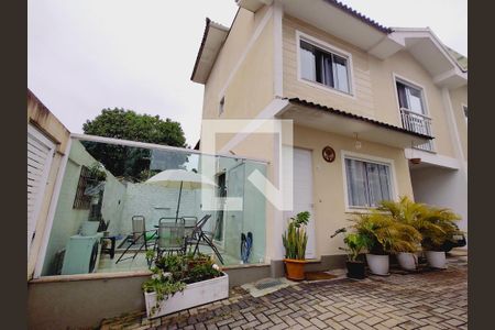 Casa de condomínio à venda com 110m², 3 quartos e 1 vagaFachada 