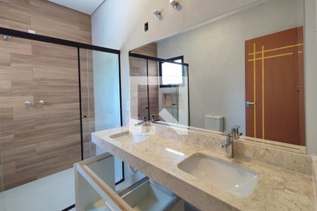 Banheiro Suíte 1 de casa de condomínio à venda com 3 quartos, 379m² em Swiss Park, Campinas