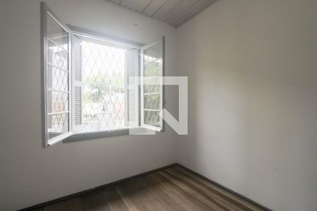 Quarto 1 de casa para alugar com 3 quartos, 120m² em Navegantes, Porto Alegre