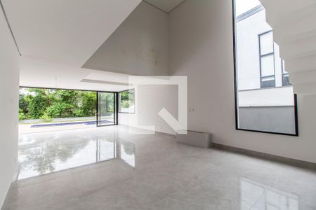 Casa de condomínio à venda com 370m², 5 quartos e 9 vagasSala de TV