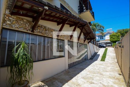 Casa de condomínio para alugar com 450m², 5 quartos e 5 vagasQuintal - lateral