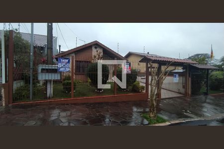Fachada de casa à venda com 2 quartos, 249m² em Cavalhada, Porto Alegre