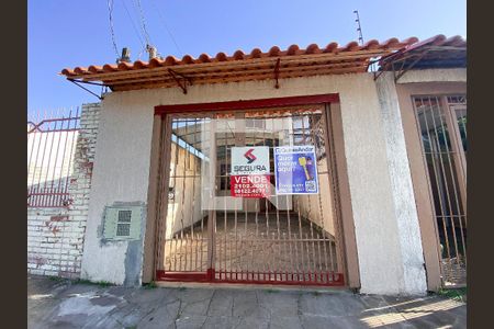 Casa à venda com 100m², 2 quartos e 1 vagafachada e placa 