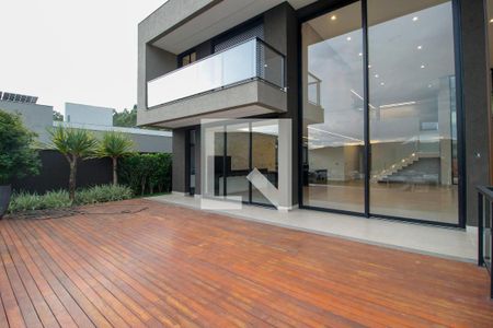 Casa de condomínio à venda com 440m², 4 quartos e 4 vagasFachada