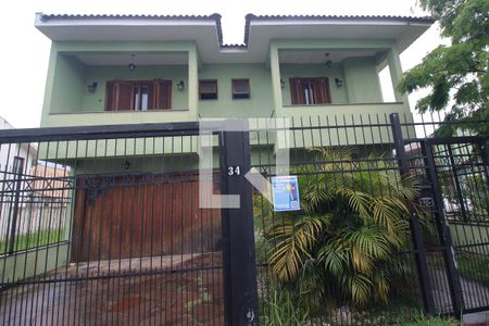 Casa à venda com 174m², 3 quartos e 2 vagas Casa à venda com 174m², 3 quartos e 2 vagasFachada