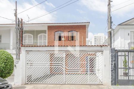 Casa à venda com 170m², 4 quartos e 2 vagas Casa à venda com 170m², 4 quartos e 2 vagasFachada
