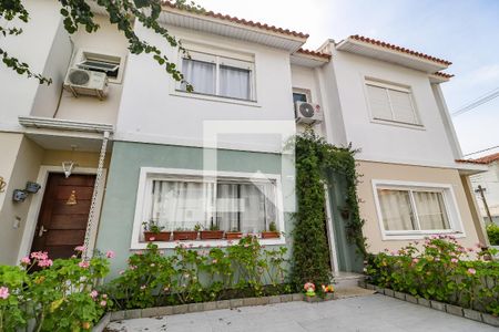 Casa de condomínio à venda com 142m², 3 quartos e 2 vagasFachada da casa