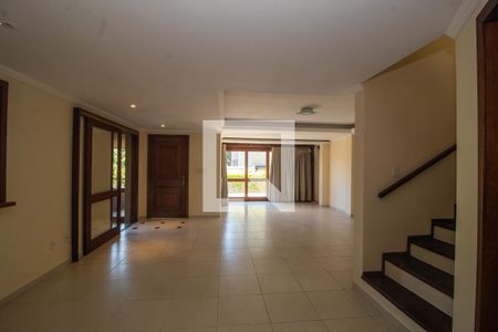 Sala de casa de condomínio para alugar com 3 quartos, 256m² em Vila Assunção, Porto Alegre
