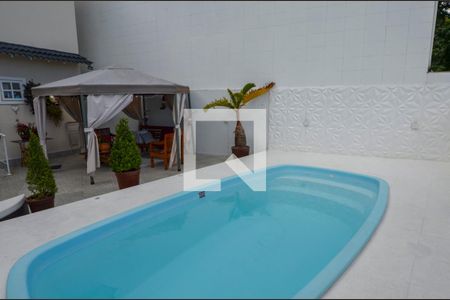 Casa de condomínio à venda com 450m², 5 quartos e 1 vagaÁrea externa