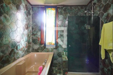 Casa à venda com 375m², 4 quartos e 2 vagasBanheiro da Suíte