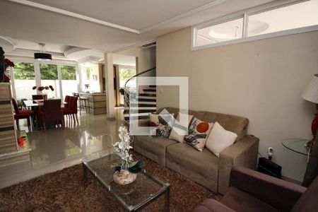 Sala 1 de casa de condomínio para alugar com 3 quartos, 180m² em Pedra Redonda, Porto Alegre