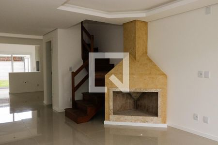 Sala de casa à venda com 3 quartos, 120m² em Guarujá, Porto Alegre
