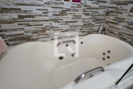 Casa de condomínio à venda com 300m², 4 quartos e 2 vagasBanheiro da Suíte 1