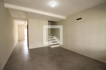 Sala de casa à venda com 3 quartos, 123m² em Guarujá, Porto Alegre