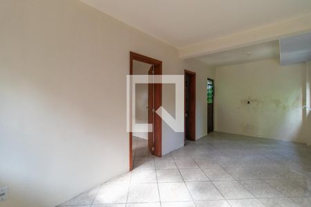 Sala de casa de condomínio para alugar com 1 quarto, 42m² em Vila Nova, Porto Alegre