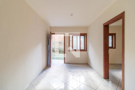 Sala de casa de condomínio para alugar com 1 quarto, 42m² em Vila Nova, Porto Alegre