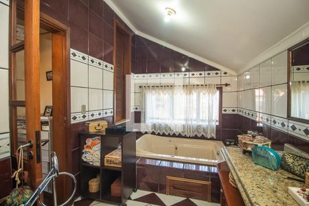 Banheiro da Suite de casa à venda com 4 quartos, 300m² em Espírito Santo, Porto Alegre