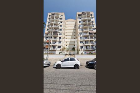 Apartamento à venda com 65m², 2 quartos e 1 vagaFachada + Plaquinha