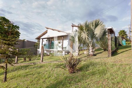 Casa de condomínio à venda com 280m², 4 quartos e 2 vagas Casa de condomínio à venda com 280m², 4 quartos e 2 vagasFachada