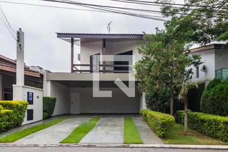 Casa de condomínio à venda com 360m², 4 quartos e 6 vagas Casa de condomínio à venda com 360m², 4 quartos e 6 vagasFachada