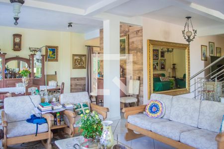 Sala de casa à venda com 4 quartos, 329m² em Vila Nova, Porto Alegre