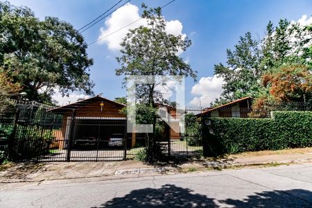 Casa à venda com 410m², 4 quartos e 4 vagas Casa à venda com 410m², 4 quartos e 4 vagasFachada e garagem