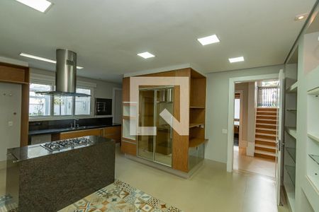 Casa de condomínio para alugar com 490m², 4 quartos e 4 vagasCozinha 