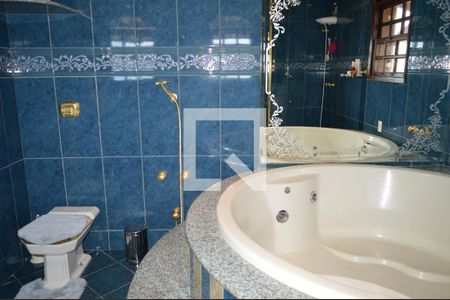 Casa à venda com 550m², 4 quartos e 4 vagasBanheiro da suite