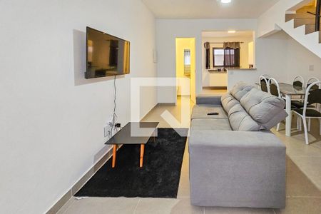 Sala de casa de condomínio para alugar com 2 quartos, 75m² em Balneario Praia do Perequê, Guarujá
