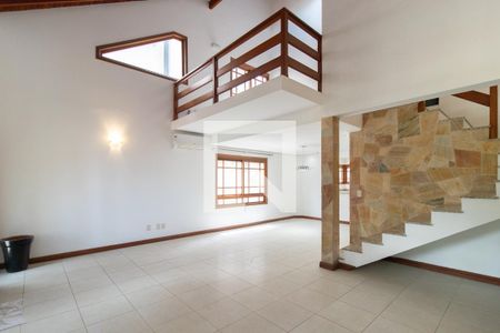 Sala de casa de condomínio à venda com 3 quartos, 180m² em Hípica, Porto Alegre