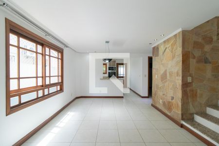 Sala de casa de condomínio à venda com 3 quartos, 180m² em Hípica, Porto Alegre