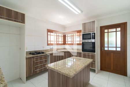 Casa de condomínio à venda com 180m², 3 quartos e 4 vagas Casa de condomínio à venda com 180m², 3 quartos e 4 vagasCozinha