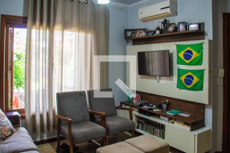 Sala de casa de condomínio à venda com 2 quartos, 167m² em Guarujá, Porto Alegre