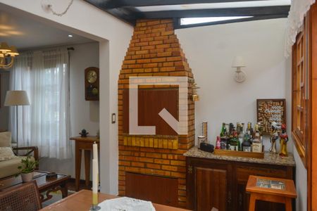 Sala com churrasqueira de casa de condomínio à venda com 3 quartos, 230m² em Tristeza, Porto Alegre