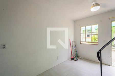 Sala 1 de casa de condomínio à venda com 1 quarto, 49m² em São José, Porto Alegre